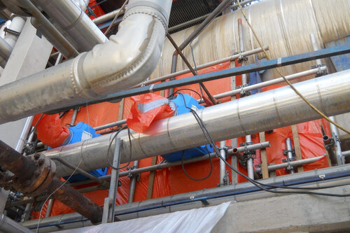 Industrial containment showing air exhausts